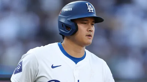 Shohei Ohtani #17 of the Los Angeles Dodgers walks to the first base during the ninth inning of Game Two of the Championship Series against the New York Mets at Dodger Stadium on October 14, 2024 in Los Angeles, California.