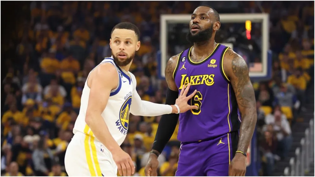 Stephen Curry of the Golden State Warriors defends LeBron James of the Los Angeles Lakers – Ezra Shaw/Getty Images