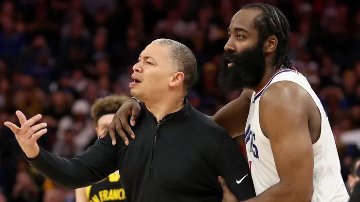 James Harden #1 holds back LA Clippers head coach Tyronn Lue during their game against the Golden State Warriors at Chase Center on February 14, 2024 in San Francisco, California.
