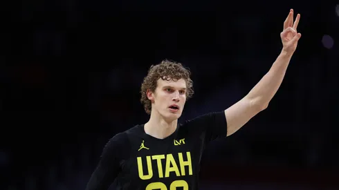 Lauri Markkanen #23 of the Utah Jazz celebrates after scoring a basket against the Washington Wizards