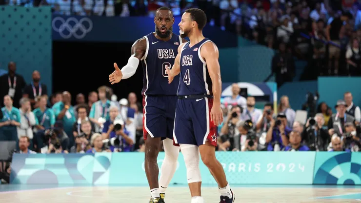 LeBron James #6 and Stephen Curry #4 of Team United States react during the Men's Gold Medal game between Team France and Team United States on day fifteen of the Olympic Games Paris 2024 at Bercy Arena on August 10, 2024 in Paris, France.