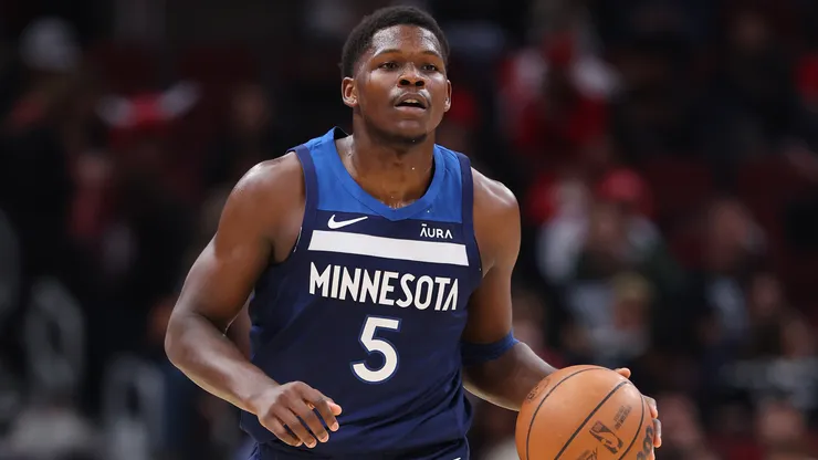 Anthony Edwards #5 of the Minnesota Timberwolves dribbles up the court against the Chicago Bulls