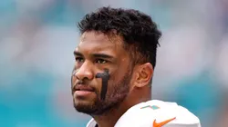 Tua Tagovailoa #1 of the Miami Dolphins looks on before the game against the Atlanta Falcons at Hard Rock Stadium on October 24, 2021 in Miami Gardens, Florida.