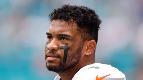 Tua Tagovailoa #1 of the Miami Dolphins looks on before the game against the Atlanta Falcons at Hard Rock Stadium on October 24, 2021 in Miami Gardens, Florida.