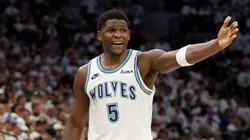 Anthony Edwards #5 of the Minnesota Timberwolves talks to referee Zach Zarba #15 during the second quarter against the Dallas Mavericks in Game Two of the Western Conference Finals at Target Center on May 24, 2024 in Minneapolis, Minnesota.