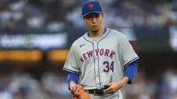 Kodai Senga #34 of the New York Mets walks across the field after being relieved in the second inning against the Los Angeles Dodgers during Game One of the Championship Series at Dodger Stadium on October 13, 2024 in Los Angeles, California. (Photo by Harry How/Getty Images)