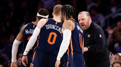 Head coach Tom Thibodeau of the New York Knicks talks with Miles McBride #2, Donte DiVincenzo #0, and Jalen Brunson #11 during the second half against the Sacramento Kings at Madison Square Garden on April 04, 2024 in New York City. The Knicks won 120-109.