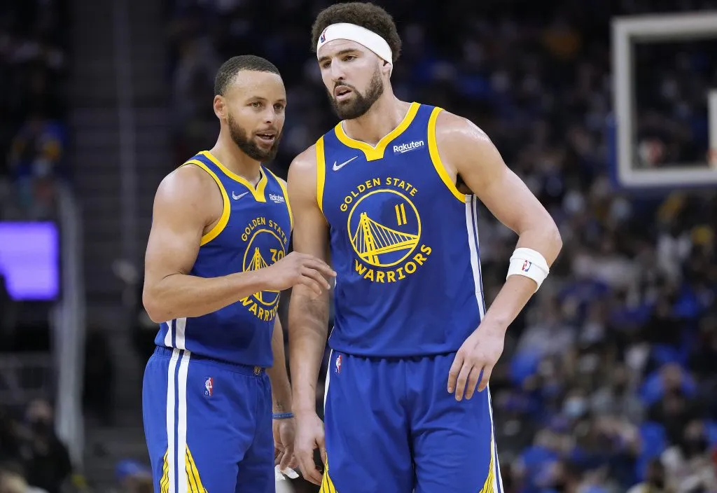 Klay Thompson #11 and Stephen Curry #30 of the Golden State Warriors talks with each other against Indiana Pacers Henderson/Getty Images