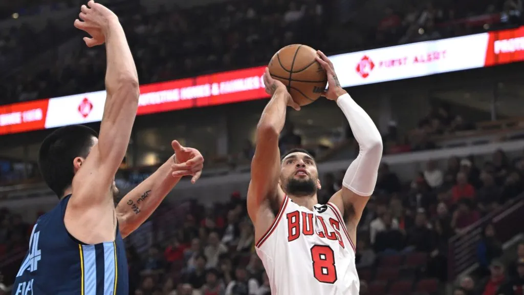 Zach LaVine #8 of the Chicago Bulls shoots in the first half of a preseason game against the Memphis Grizzlies at the United Center on October 12, 2024 in Chicago, Illinois. 