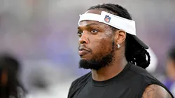 Derrick Henry #22 of the Baltimore Ravens watches the preseason game in the first quarter against the Philadelphia Eagles at M&T Bank Stadium on August 09, 2024 in Baltimore, Maryland.