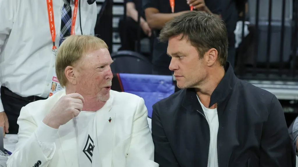 Las Vegas Raiders owner and managing general partner and Las Vegas Aces owner Mark Davis (L) and Tom Brady attend Game One of the 2023 WNBA Playoffs finals between the Aces and the New York Liberty at Michelob ULTRA Arena on October 08, 2023 in Las Vegas, Nevada. 