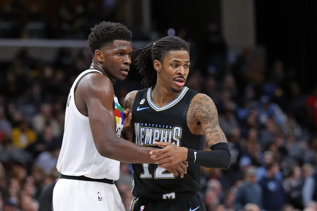 Anthony Edwards #1 of the Minnesota Timberwolves and Ja Morant #12 of the Memphis Grizzlies look on during the second half at FedExForum. Justin Ford/Getty Images