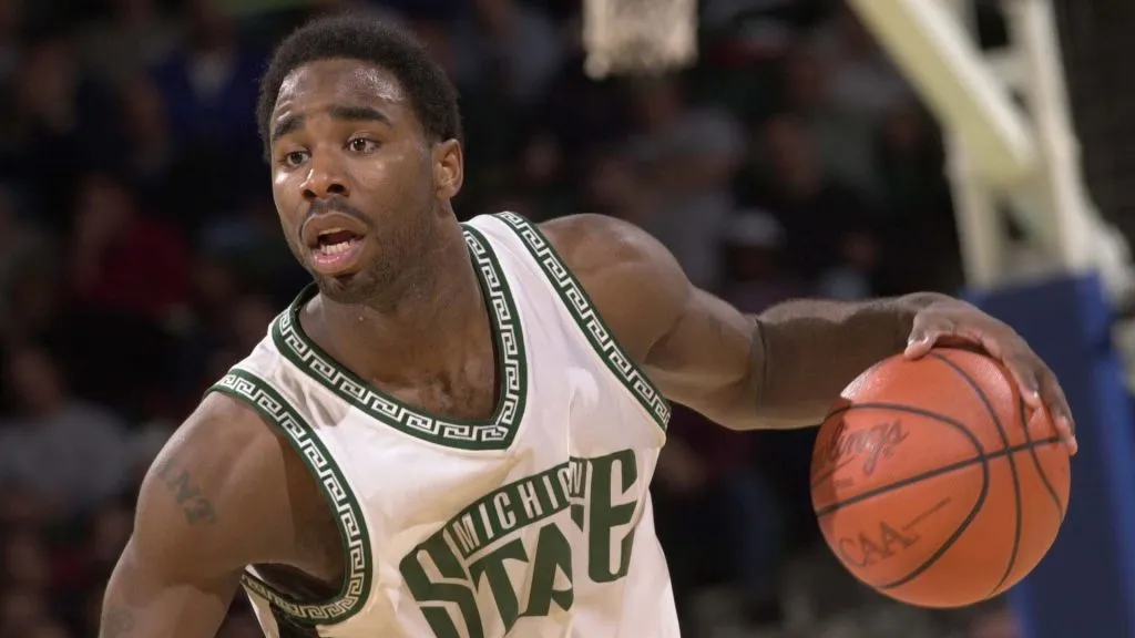 Mateen Cleaves #12 of Michigan State University moves the ball upcourt against Valparaiso University during the first round of the NCAA Tournament Midwest Regionals at Cleveland State University Convocation Center in Cleveland, Ohio. 