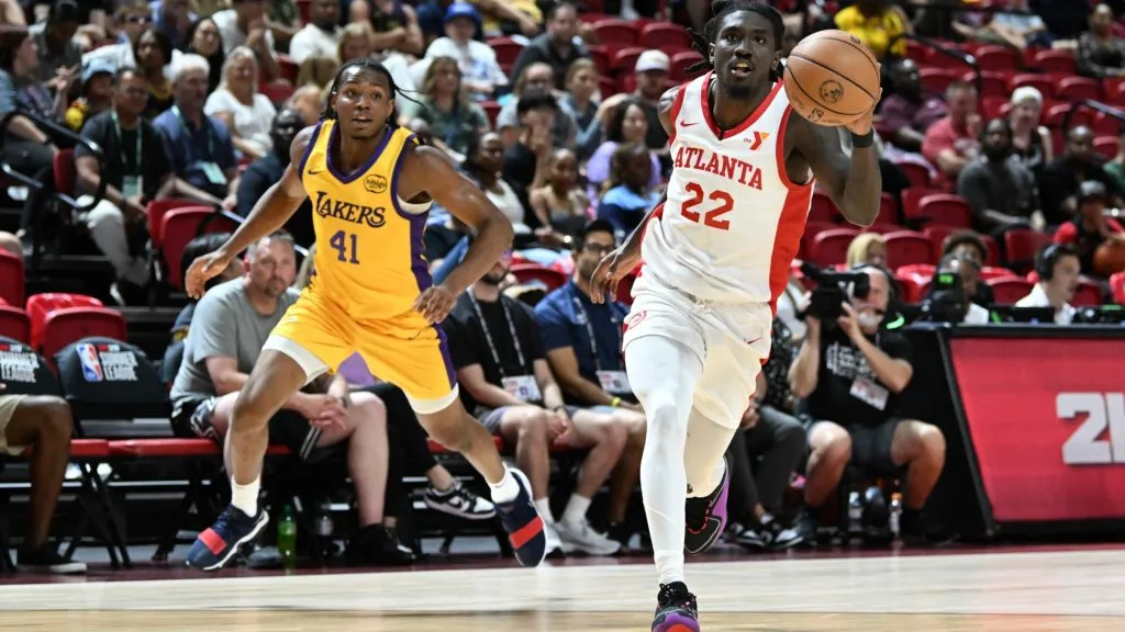Keaton Wallace #22 of the Atlanta Hawks dribbles the ball past Quincy Olivari #41 of the Los Angeles Lakers in the second half of a 2024 NBA Summer League game at the Thomas &amp; Mack Center on July 17, 2024 in Las Vegas, Nevada. The Lakers defeated the Hawks 87-86.  (Photo by Candice Ward/Getty Images)