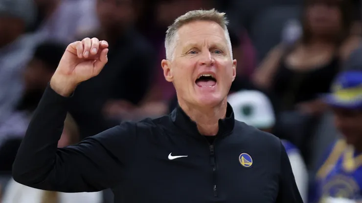 Golden State Warriors head coach Steve Kerr shouts to his team during their preseason game against the Sacramento Kings at Golden 1 Center on October 09, 2024 in Sacramento, California.