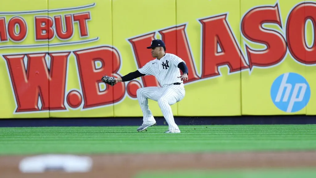 Juan Soto #22 of the New York Yankees fields a single by Michael Massey #19 of the Kansas City Royals in the second inning during Game Two of the Division Series at Yankee Stadium on October 07, 2024 in New York City. (Photo by Elsa/Getty Images)