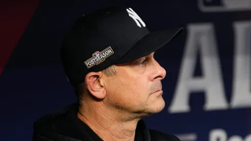 Manager Aaron Boone #17 of the New York Yankees looks on prior to the game against the Kansas City Royals during Game Four of the Division Series at Kauffman Stadium on October 10, 2024 in Kansas City, Missouri.