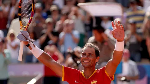 Rafael Nadal of Team Spain celebrates after winning match point against Marton Fucsovics of Team Hungary during the Men’s Singles first round match on day two of the Olympic Games Paris 2024 at Roland Garros on July 28, 2024 in Paris, France. (Photo by Clive Brunskill/Getty Images)