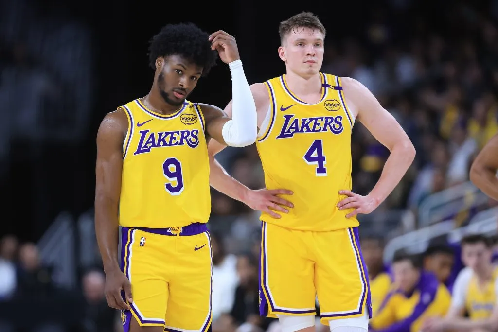 Bronny James #9 and Dalton Knecht #4 of the Los Angeles Lakers look on during the second half of a game against the Minnesota Timberwolves. Sean M. Haffey/Getty Images