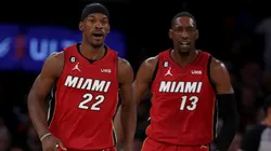 Jimmy Butler #22 and Bam Adebayo #13 of the Miami Heat celebrate in the second half of game one of the Eastern Conference Semifinals against the New York Knicks at Madison Square Garden on April 30, 2023 in New York City. The Miami Heat defeated the New York Knicks 108-101.