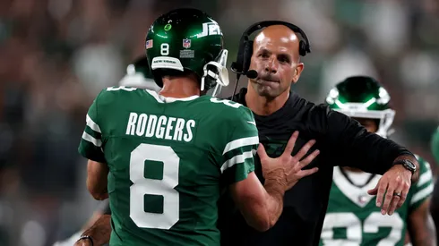 Head coach Robert Saleh of the New York Jets celebrates with Aaron Rodgers #8 after a touchdown against the New England Patriots during the second quarter in the game at MetLife Stadium on September 19, 2024 in East Rutherford, New Jersey. (Photo by Al Bello/Getty Images)