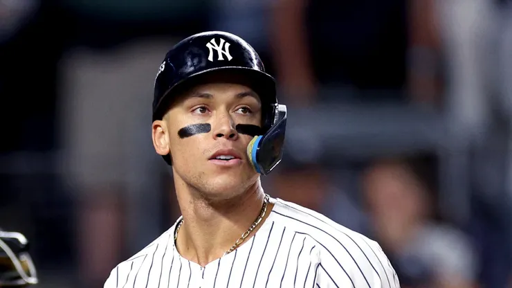 Aaron Judge #99 of the New York Yankees reacts after striking out against the Kansas City Royals during the first inning in Game One of the Division Series at Yankee Stadium on October 05, 2024 in New York City.