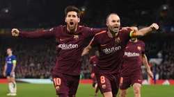 Lionel Messi of Barcelona celebrates his equaliser with team mate Andres Iniesta during the UEFA Champions League Round of 16 First Leg match between Chelsea FC and FC Barcelona