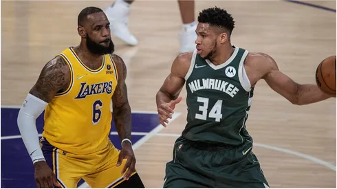 LeBron James of the Los Angeles Lakers defends against Giannis Antetokounmpo of the Milwaukee Bucks