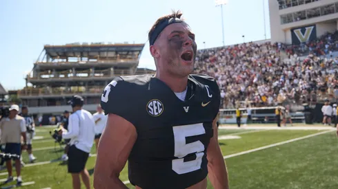Richie Hoskins #5 of the Vanderbilt Commodores celebrates after an overtime victory over Virginia Tech Hokies at FirstBank Stadium on August 31, 2024 in Nashville, Tennessee.