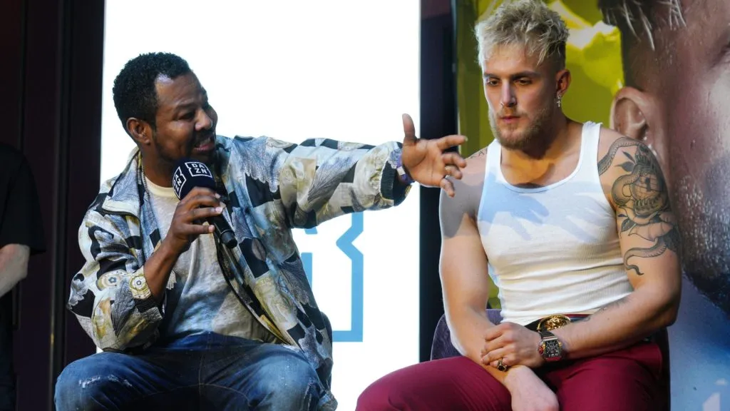 Former professional boxer Shane Mosley (L) and boxer Jake Paul speak onstage during the Jake Paul VS. Anesongib press conference at Beauty & Essex on January 08, 2020 in Los Angeles, California.