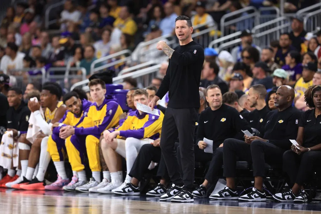 Los Angeles Lakers Head Coach JJ Redick looks on from the bench during the first half of a game against the Minnesota Timberwolves. Sean M. Haffey/Getty Images