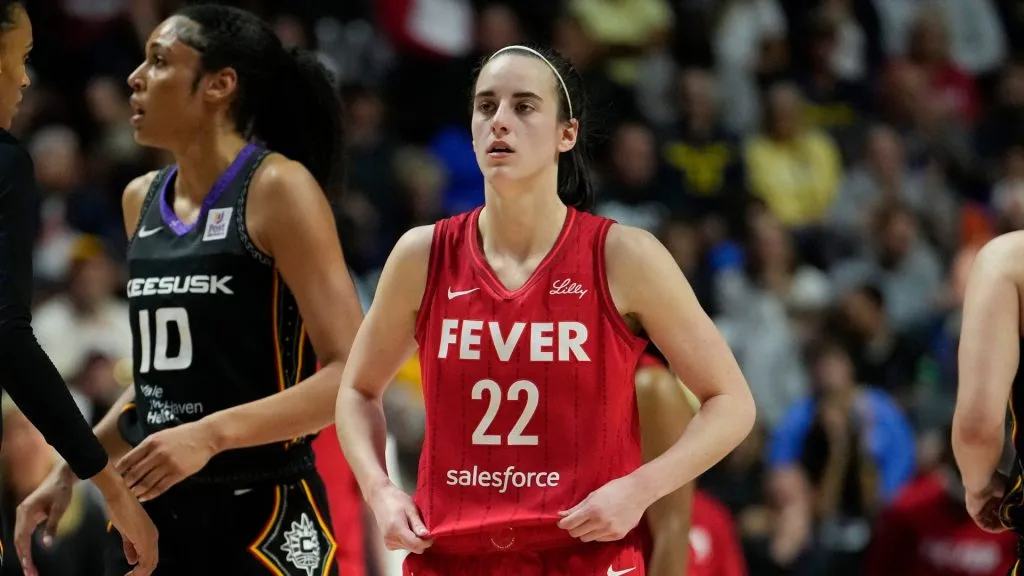 Caitlin Clark #22 of the Indiana Fever looks on against the Connecticut Sun during the fourth quarter of Game Two of the 2024 WNBA Playoffs first round at Mohegan Sun Arena on September 25, 2024 in Uncasville, Connecticut. The Connecticut Sun won 87-81 over the Indiana Fever.