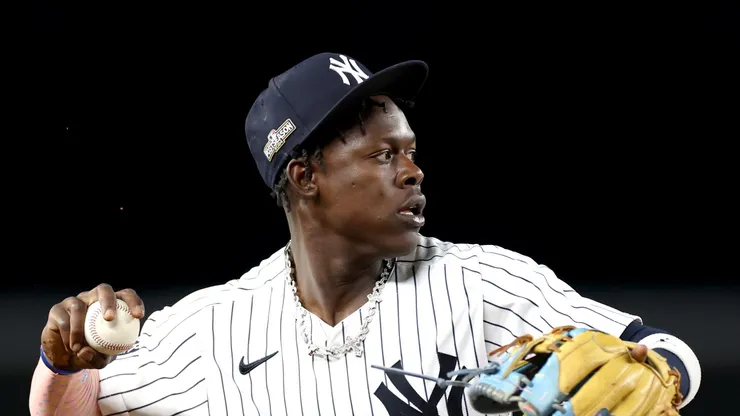 Jazz Chisholm Jr. #13 of the New York Yankees fields the ball against the Kansas City Royals during the seventh inning in Game One of the Division Series at Yankee Stadium on October 05, 2024 in New York City.