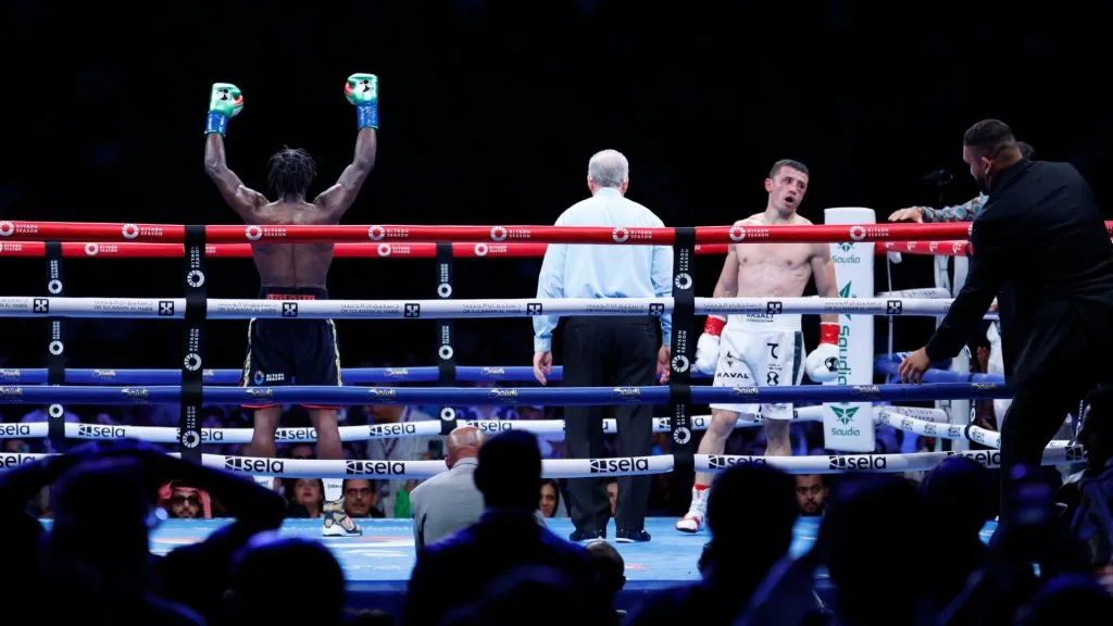 Terence Crawford (L) reacts at the end of the WBA junior middleweight title bout against Israel Madrimov during the 11th round of the at BMO Stadium on August 3, 2024 in Los Angeles, California.