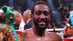 Terence Crawford celebrates with his championship belts after defeating Errol Spence Jr. in the World Welterweight Championship bout at T-Mobile Arena on July 29, 2023 in Las Vegas, Nevada.