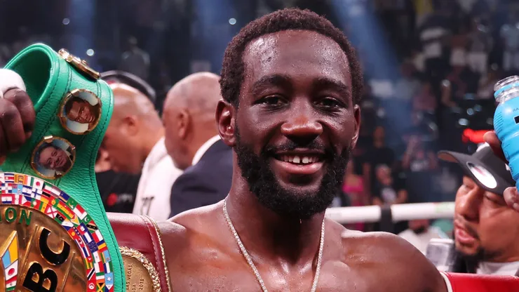 Terence Crawford celebrates with his championship belts after defeating Errol Spence Jr. in the World Welterweight Championship bout at T-Mobile Arena on July 29, 2023 in Las Vegas, Nevada.