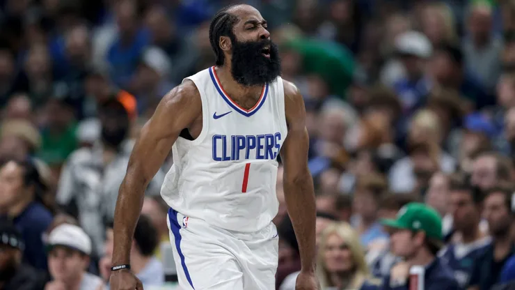 James Harden #1 of the Los Angeles Clippers reacts after a three-point basket in the first half against the Dallas Mavericks during game four of the Western Conference First Round Playoffs at American Airlines Center on April 28, 2024 in Dallas, Texas.