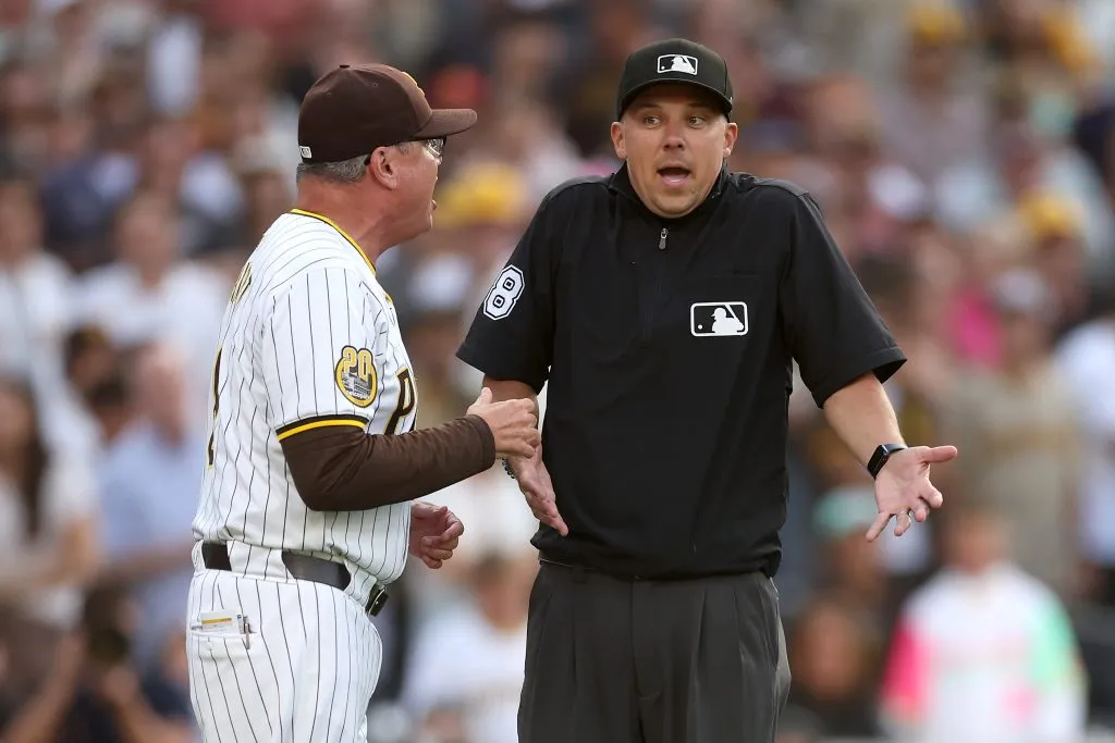 Manager Mike Shildt argues with third base umpire Adam Hamari and is ejected after Jurickson Profar #10 of the San Diego Padres was hit by a pitch following a verbal altercation with Keibert Ruiz #20 of the Washington Nationals during the first inning of a game at Petco Park on June 25, 2024 in San Diego, California. (Photo by Sean M. Haffey/Getty Images)