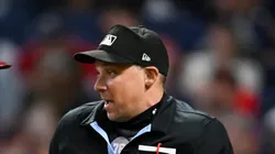 Home plate umpire Adam Hamari during the Guardians-Rangers ninth inning at Progressive Field on August 23, 2024 in Cleveland, Ohio.