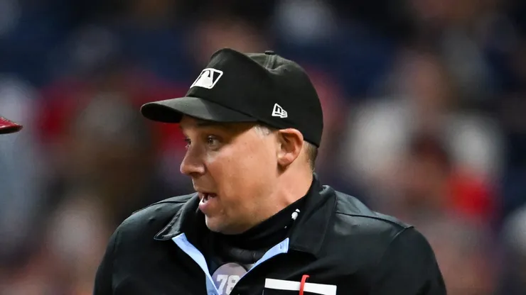 Home plate umpire Adam Hamari during the Guardians-Rangers ninth inning at Progressive Field on August 23, 2024 in Cleveland, Ohio.