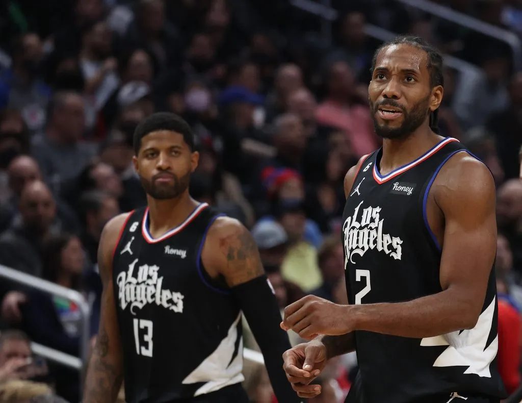 Kawhi Leonard #2 of the LA Clippers reacts after a Minnesota Timberwolves foul in front of Paul George #13 during a 99-88 win. Harry How/Getty Images