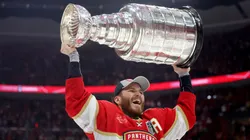 Matthew Tkachuk #19 of the Florida Panthers lifts the Stanley Cup after Florida's 2-1 victory against the Edmonton Oilers in Game Seven of the 2024 Stanley Cup Final at Amerant Bank Arena on June 24, 2024 in Sunrise, Florida. (Photo by Carmen Mandato/Getty Images)