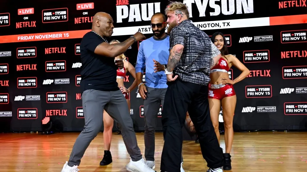 Mike Tyson and Jake Paul face off at an exclusive press conference ahead of their November bout during the Fanatics Fest NYC 2024 at Jacob Javits Center on August 18, 2024 in New York City. 