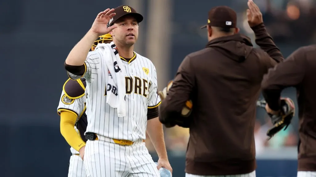 Michael King #34 of the San Diego Padres high fives teammates prior to Game One of the Wild Card Series against the Atlanta Braves at Petco Park on October 01, 2024 in San Diego, California. (Photo by Sean M. Haffey/Getty Images)