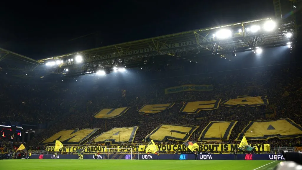 General view inside the stadium, as the fans display a tifo, which reads “UEFA MAFIA” and a banner which reads “You don’t care about the sport – all you care about is money” prior to the UEFA Champions League 2024/25 League Phase MD6 match between Borussia Dortmund and Celtic FC at BVB Stadion Dortmund on October 01, 2024 in Dortmund, Germany. (Photo by Dean Mouhtaropoulos/Getty Images)