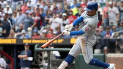 Francisco Lindor #12 of the New York Mets hits a two-run homer to score Starling Marte in the ninth inning of game one of a doubleheader against the Atlanta Braves at Truist Park on September 30, 2024 in Atlanta, Georgia. (Photo by Edward M. Pio Roda/Getty Images)