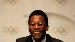 Brazilian soccer legend Pele smiles during a press conference after the Rio 2016 presentation