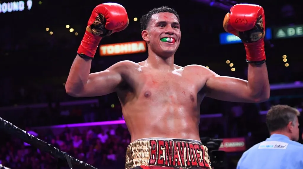 David Benavidez (red/green trunks) reacts after defeating Anthony Dirrell (not in frame) after a corner stoppage in their WBC Super Middleweight Championship fight at Staples Center on September 28, 2019 in Los Angeles, California. (Photo by Jayne Kamin-Oncea/Getty Images)