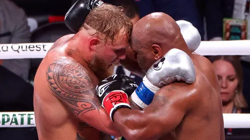 (L-R) Jake Paul and Mike Tyson fight during LIVE On Netflix: Jake Paul vs. Mike Tyson at AT&T Stadium on November 15, 2024 in Arlington, Texas.