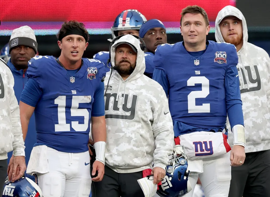 EAST RUTHERFORD, NEW JERSEY – NOVEMBER 24: Tommy DeVito #15, head coach Brian Daboll and Drew Lock #2 of the New York Giants react on the sideline the extra point was made on a Giants touchdown against the Tampa Bay Buccaneers at MetLife Stadium on November 24, 2024 in East Rutherford, New Jersey. (Photo by Elsa/Getty Images)